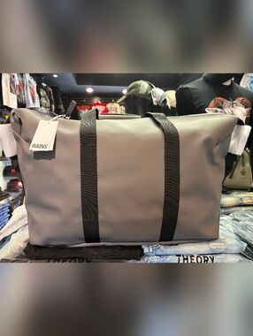 Rains Grey Duffle Bag with Black Webbing Straps